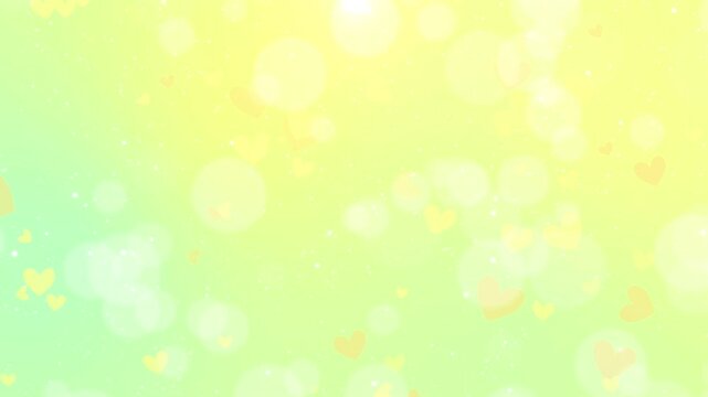 イエローとライムグリーンのパステルグラデーションにハートと光粒がゆっくり舞い上がるループ動画 / Slow rising hearts and particles on yellow green pastel gradient loop video