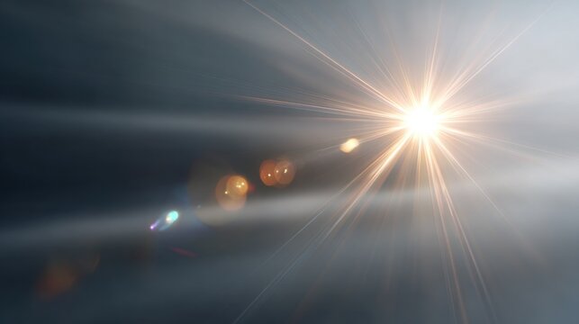 Sunlight creates a bright lens flare as it breaks through dark clouds in the late afternoon sky