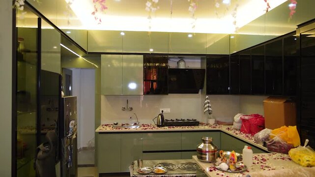 Griha Pravesh house warming ceremony in Mumbai. Traditional Indian kitchen blessing ritual.