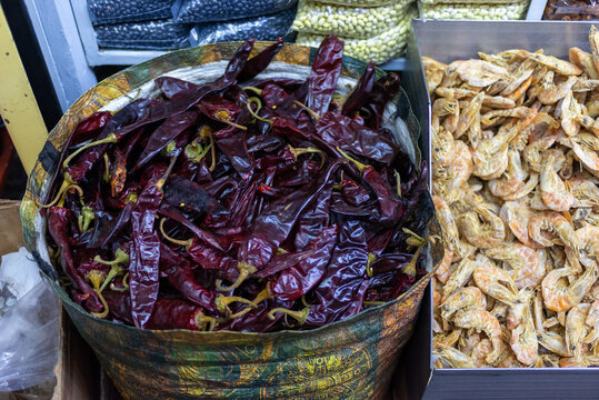 High Angle View of Dried Red Chili Peppers and Dried Shrimp at Traditional Mexican Market