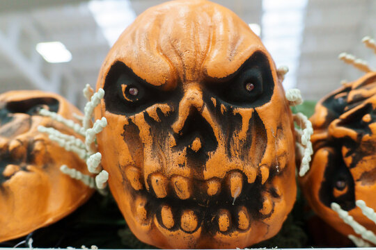 Close Up of Creepy Orange Pumpkin Skull Decoration for Halloween Celebration