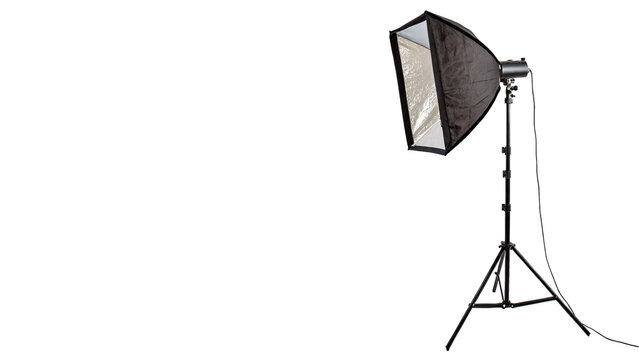 Professional studio flash light with softbox isolated on transparent background