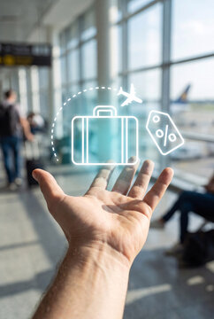hand holds glowing luggage icon with airplane trajectory line and percentage discount tag to represent flight booking deal, travel fare comparison, and vacation budget planning
