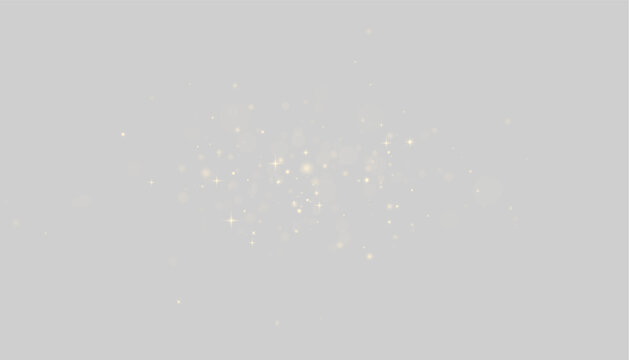 Scattered golden starbursts and glowing light bokeh on a dark background for a magical sparkle effect on transparent background