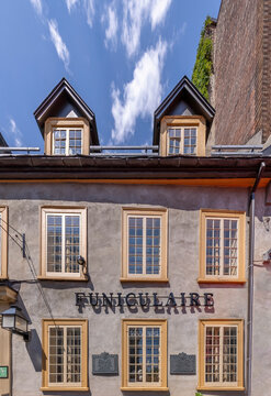 Quebec City, Quebec, Canada. August 4, 2026. Low angle view of the historic Maison Louis Jolliet facade at Old Quebec funicular station.