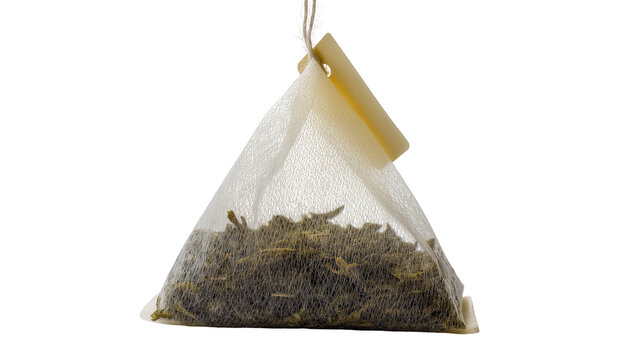 Triangular pyramid tea bag with dried leaves, isolated on transparent background
