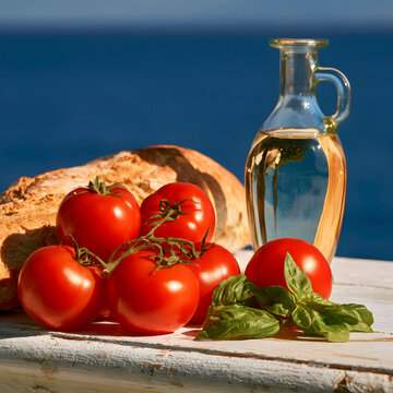 Fresh tomatoes bread and olive oil in coastal summer setting