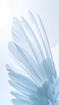 Close-up of ethereal light blue feathers forming a soft wing.