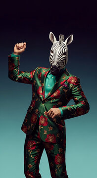 Man in a floral suit and zebra mask raises fist, showcasing bold fashion and an artistic concept with an abstract background