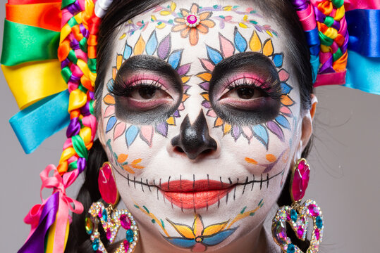 Close Up Portrait of Woman With Colorful Catrina Makeup for Day of the Dead