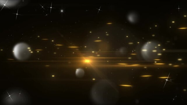 Golden light leaks and bokeh effects moving across black background with particles floating against leaks lens flares motion background motion graphics video golden with flares soft