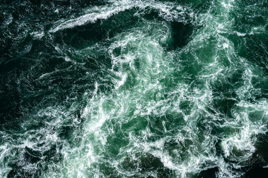 Overhead view of a swirling Naruto whirlpool captured from Uzuno-michi walkway.