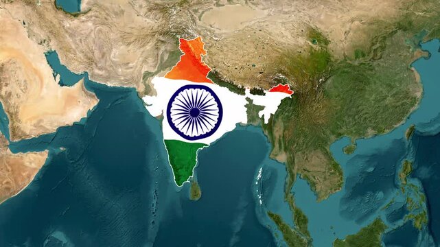 Map of india with the national flag colors and ashoka chakra symbol superimposed over a satellite view of the asian continent