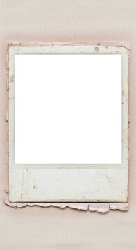 Vintage distressed instant photo frame isolated on plain background.