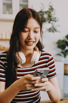 Asian woman using computer remote for business studying, watching online virtual webinar training meeting, video call. asian business woman talking on laptop in home office. Banner, copy space