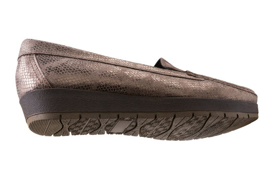 Women bronze metallic snakeskin loafers isolated on white background. Casual bronze leather wedge moccasins, side bottom view.м