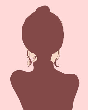 セーターを着たお団子頭の女性　シルエット