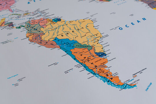 Close-up view of the South American continent on a physical geographic map, conceptualizing travel, Latin American geopolitics, and cartography.
