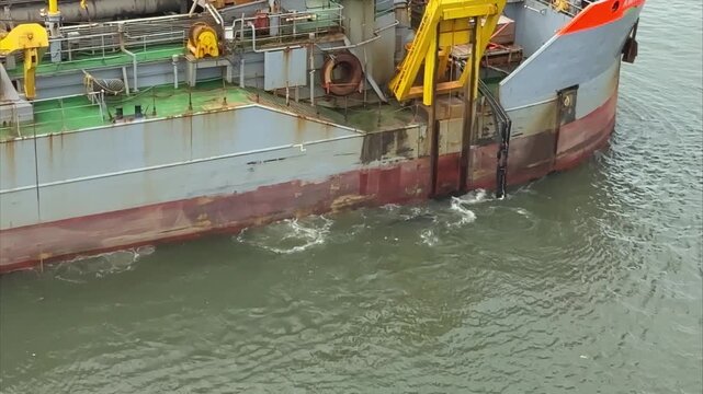 drager ship in work for deeping the canal. ship underway.