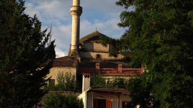 Aslan Pasha Mosque Tilt Shot, Close up View Framed by Trees at Golden Hour Light, Ioannina Old City Landmark