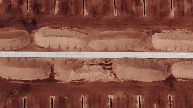 Sideways drone flight of geometric peat harvesting patterns from directly above