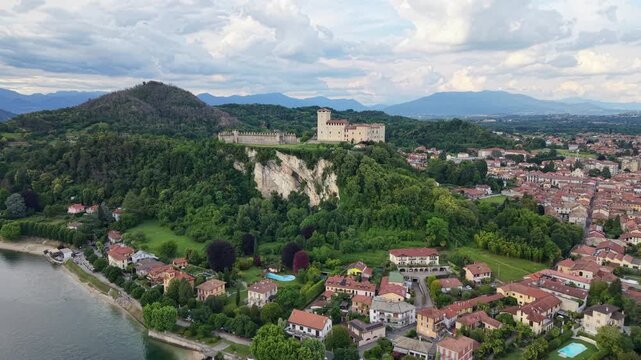 Borromeo Castle on Rocca di Angera and Town on Lake Maggiore - Aerial Pullback