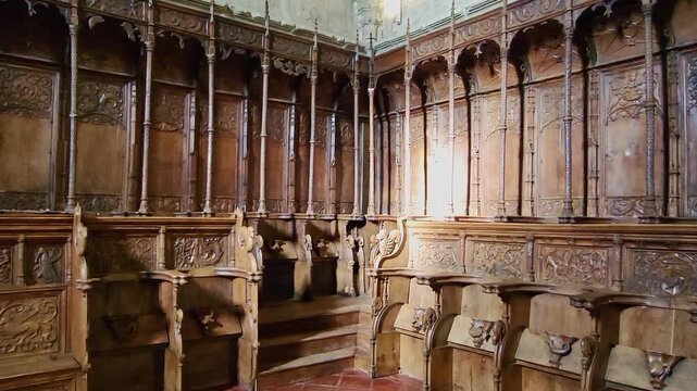 Choir stalls and lectern of the Monastery of Yuste. 16th-century wood-carved choir stalls. Monastery of San Jer&oacute;nimo de Yuste. Spain.