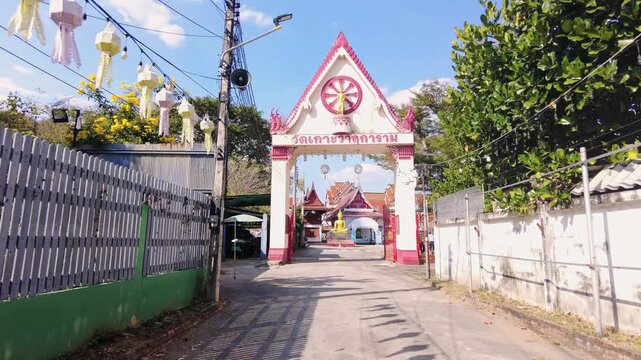 simple decorated gate to small temple couplex in northern thailand