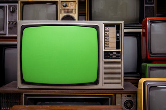 Close-up of Vintage CRT Television with Green Screen