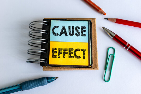 CAUSE EFFECT Relationship Shown on Colorful Notes in a Spiral Notebook
