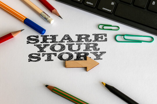 SHARE YOUR STORY Message with Wooden Arrow and Creative Office Supplies