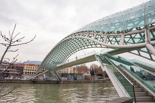 Tbilisi, Georgia, 23 January 2026: Bridge of Peace over the Kura River in Tbilisi, Georgia