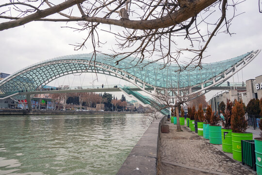 Tbilisi, Georgia, 23 January 2026: Bridge of Peace over the Kura River in Tbilisi, Georgia