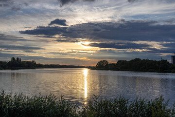 Fototapeta premium The evening sky over the lake