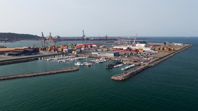 Aerial View of Shipyards, Boat Building Docks, Cranes, and Dry Docks in the Port of El Musel in Gijon, Asturias, Northern Spain