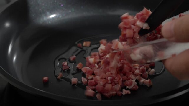 Adding Diced Bacon to the Skillet