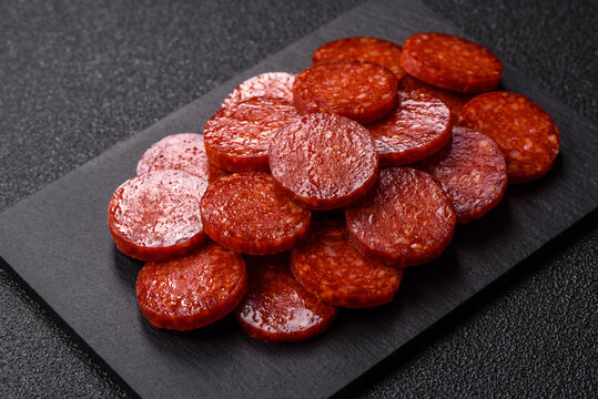 Slices of smoked pepperoni or salami for making homemade pizza. Sliced pepperoni