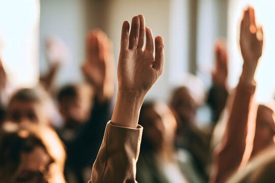 Hands were raised in the group meeting.