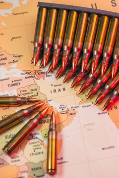 bullets standing over a world map as a conceptual metaphor for global geopolitical conflict war crisis between Ukraine, Russia, Iran, Israel, China, Taiwan, Japan, and USA in Strait of Hormuz