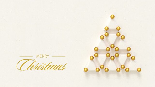 Christmas tree made from embossed paper triangles and golden baubles. English language Merry Christmas message appearing and dissolving. Loopable video