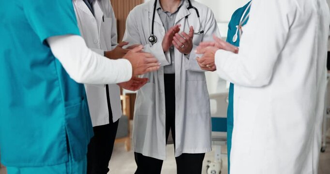 Medical, team and hands in clinic with applause, treatment goals or announcement of patient recovery. Doctor, nurse and people clap in hospital with healthcare breakthrough, celebration and success.