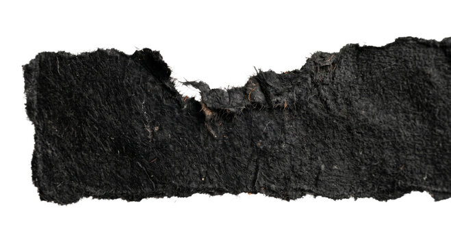 Close-up macro shot of a torn black fabric strip with frayed edges and visible fibers
