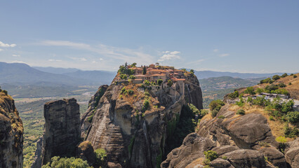 Drone view of Great Meteoron Monastery built on top of massive rock formation in Meteora Greece for...
