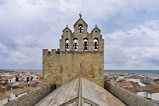 Bell tower of the Notre-Dame-de-la-Mer Roman Catholic Church, Saintes-Maries-de-la-Mer, Camargue, southern France, France