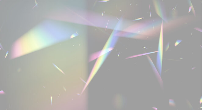 Colorful refracted light beams and prism fragments scattered against a black background on transparent background