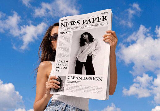Woman Model Reading Newspaper Mockup Against Blue Sky Background