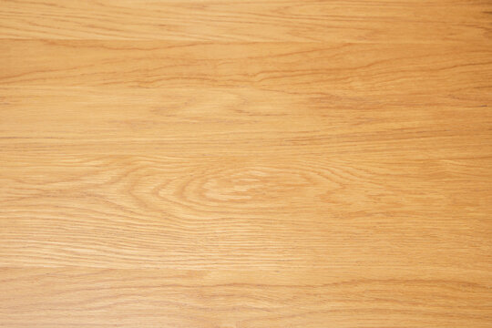 Warm Golden Oak Wood Grain Texture Background with Natural Swirling Patterns