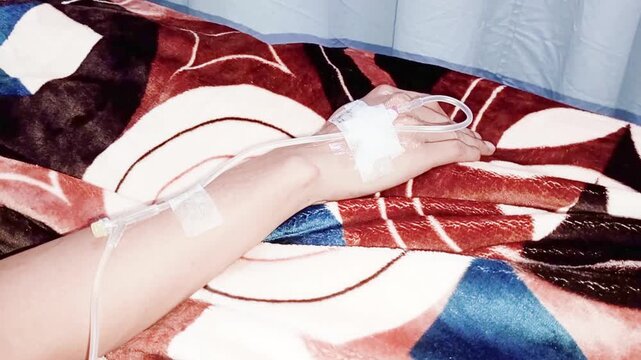 An IV needle is typically inserted into a superficial vein in the hand or arm that is straight and easily accessible. The insertion site is selected to ensure smooth fluid flow and patient comfort.