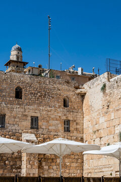 Western wall and old city buildings in jerusalem