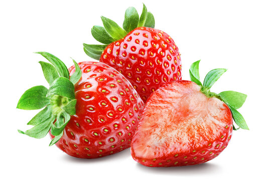 Three juicy ripe strawberries with one sliced berry isolated on transparent background.
